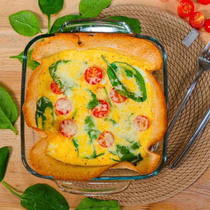 Запечённые яйца с овощами